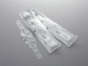 Packaged white face masks on gray background